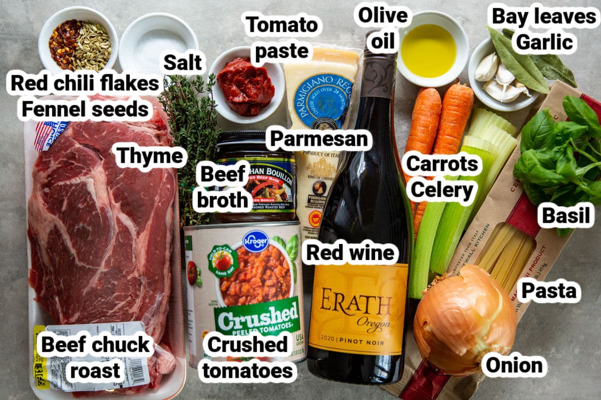 Labeled ingredients for slow cooker beef ragu.