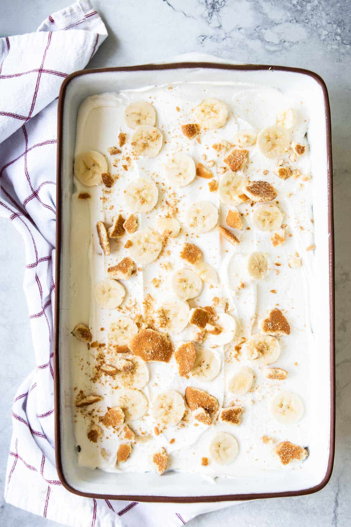 A baking dish full of banana pudding.