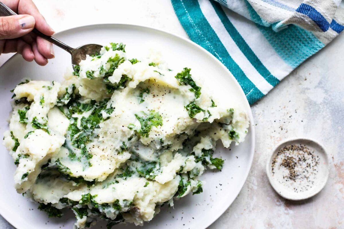 Colcannon on a white serving platter.
