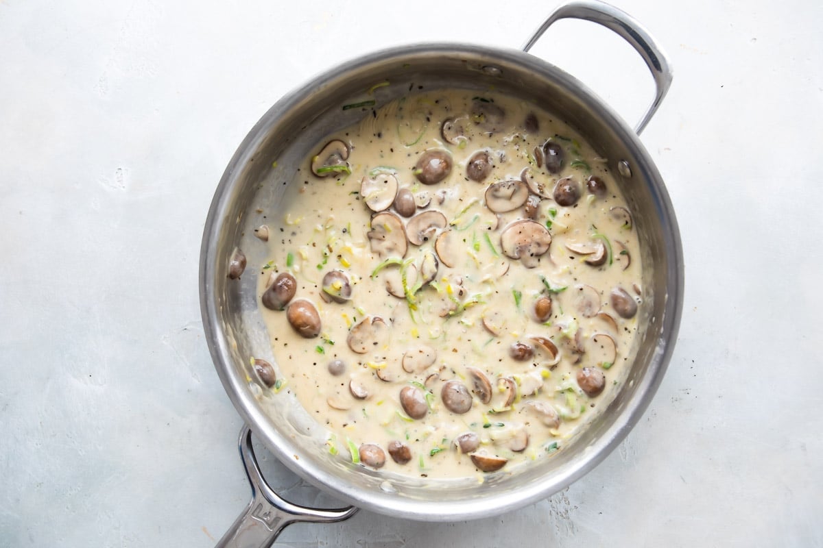 A saucepan full of mushroom leek tart filling.
