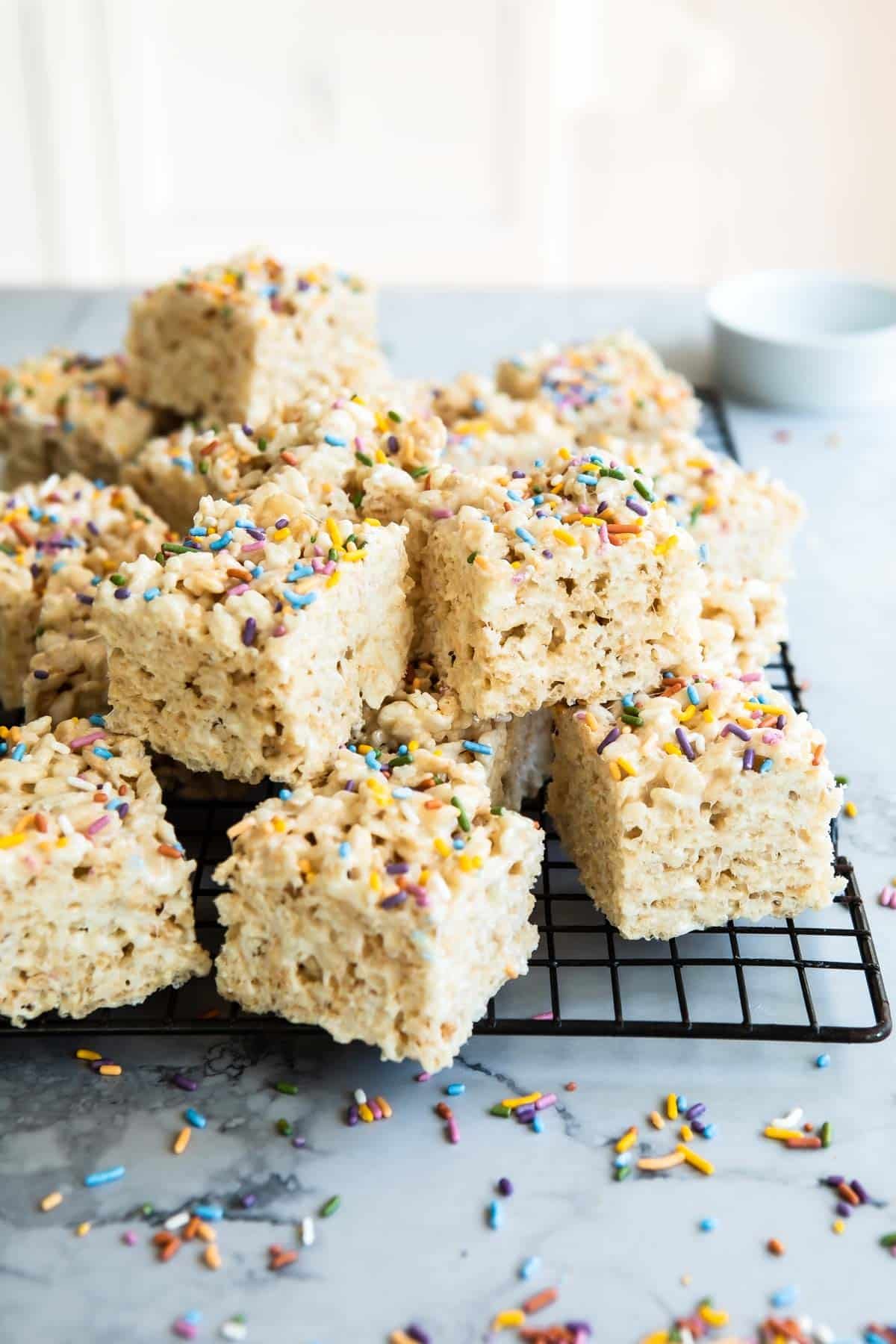 Rice Krispie treats on cooling rack.