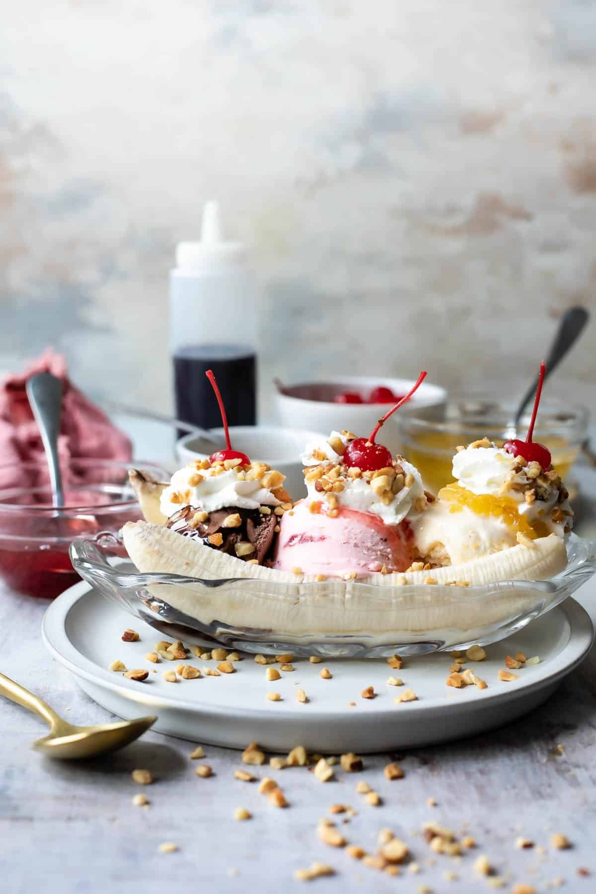 A classic banana split in a glass boat.