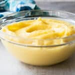 A clear bowl filled with pastry cream.