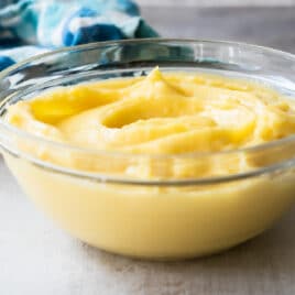 A clear bowl filled with pastry cream.