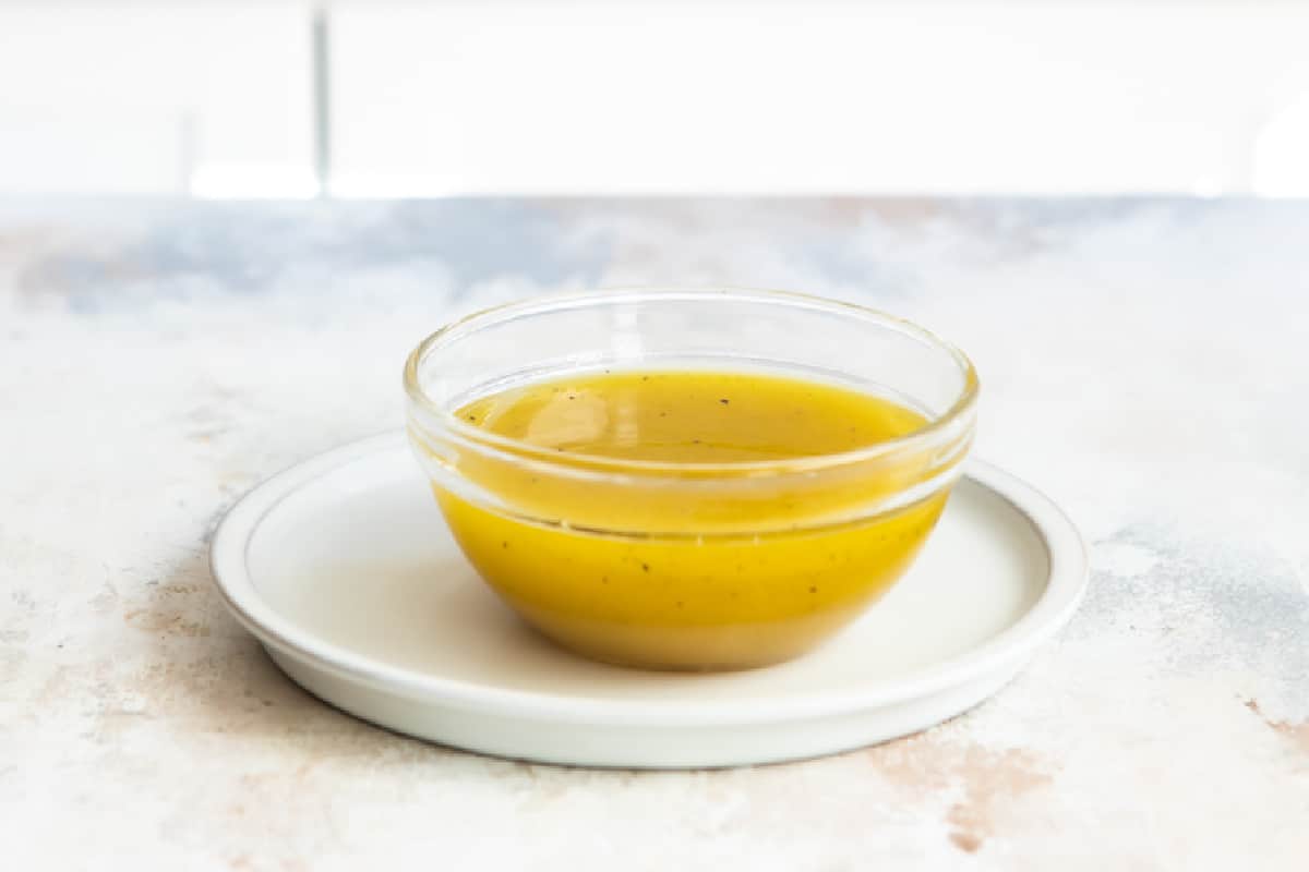 A bowl of apple cider vinaigrette.