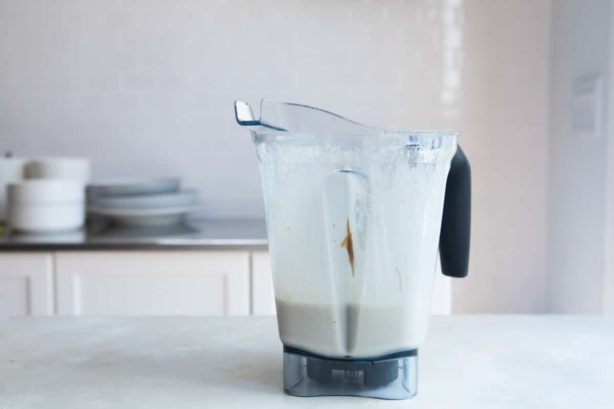 Peanut butter smoothie ingredients in a blender.