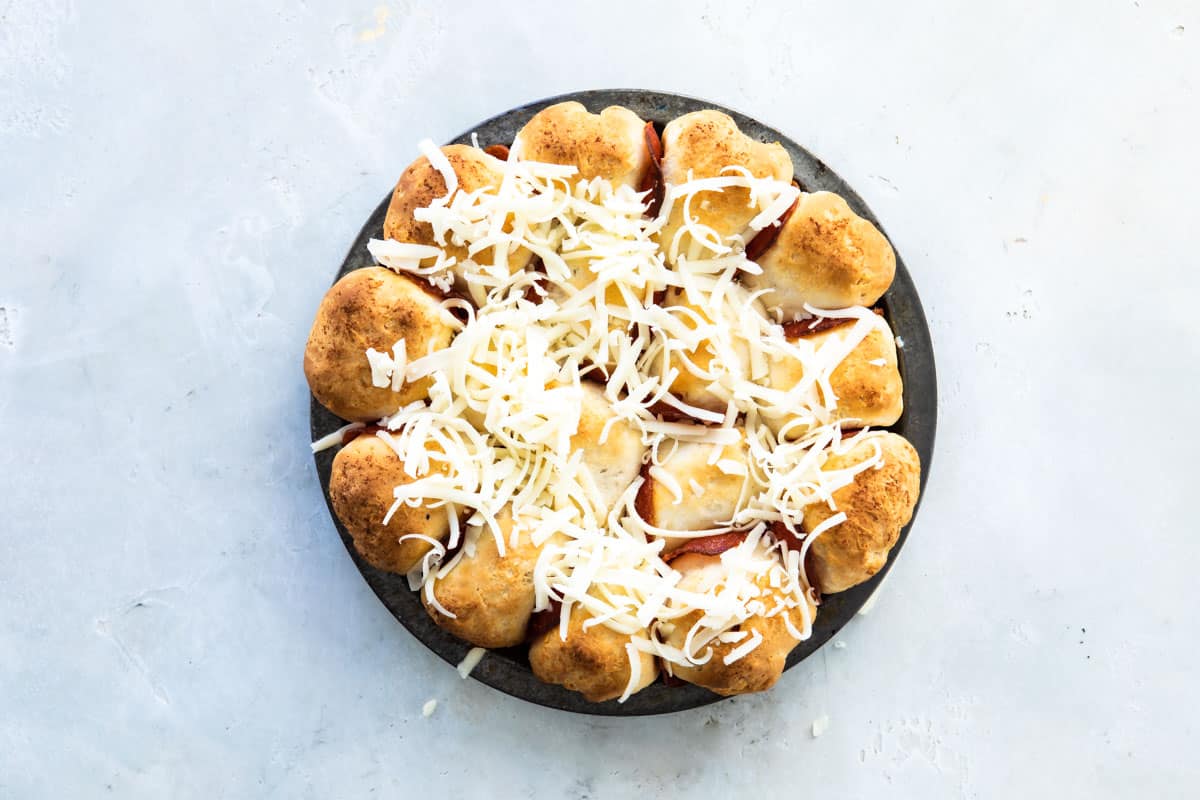 pull-apart pizza bread after baking, extra cheese on top.