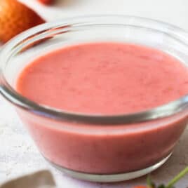 Strawberry Vinaigrette in a clear dish.