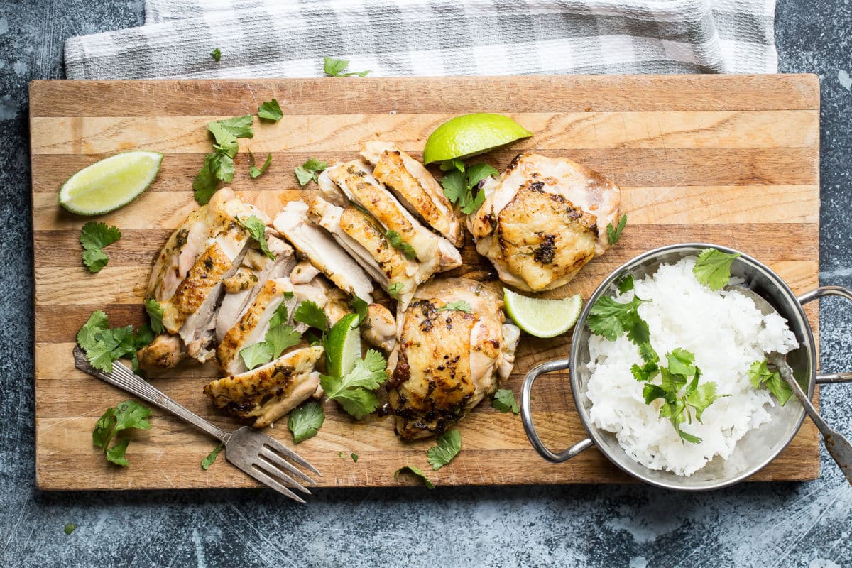 A cutting board full of sliced cilantro-lime chicken
