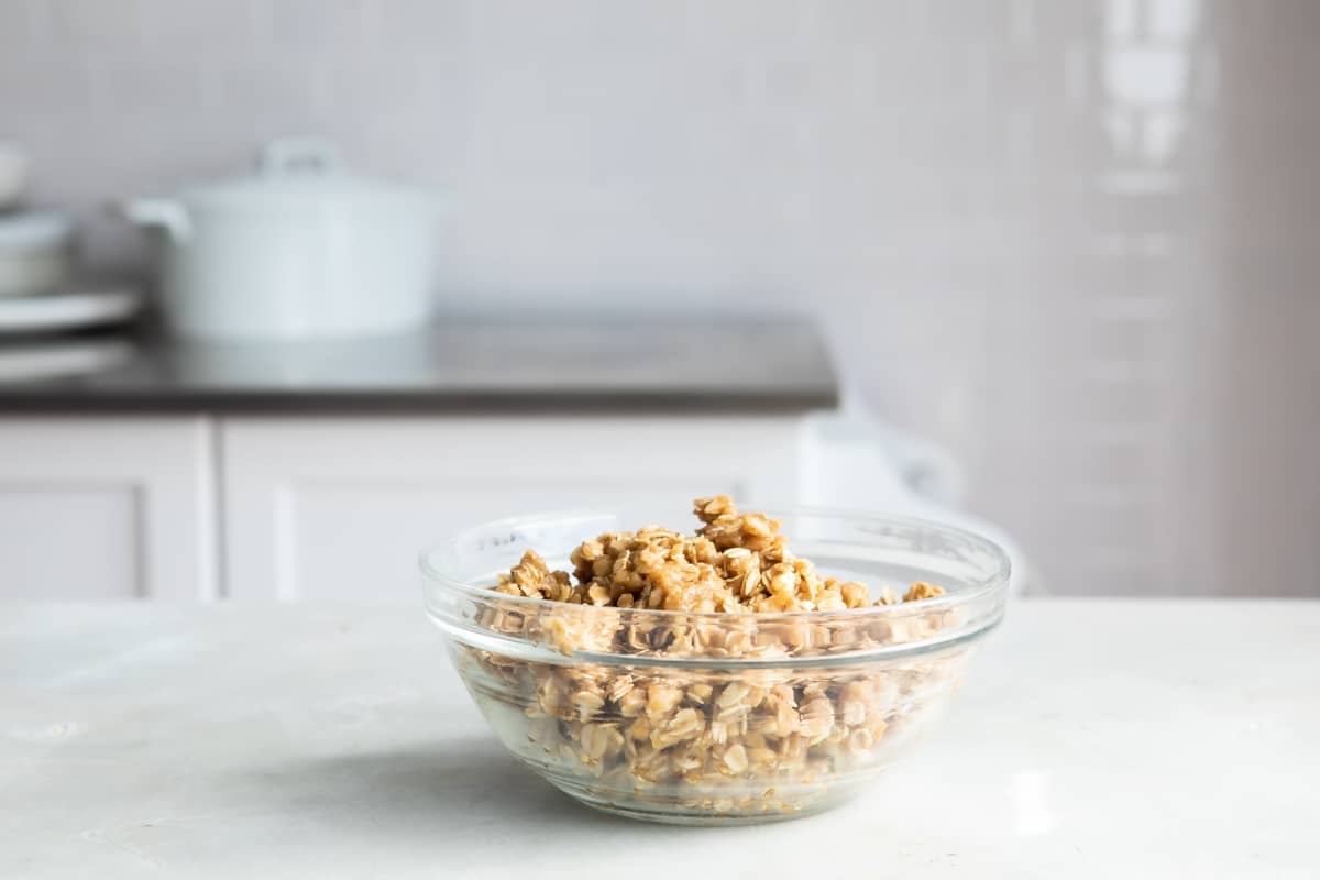 A bowl of topping for fruit crisp desserts.