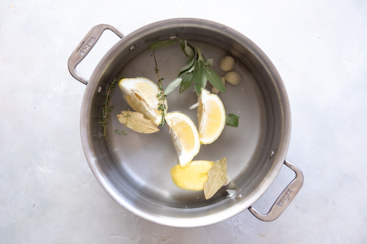 A pot of brine for smoked chicken breast.