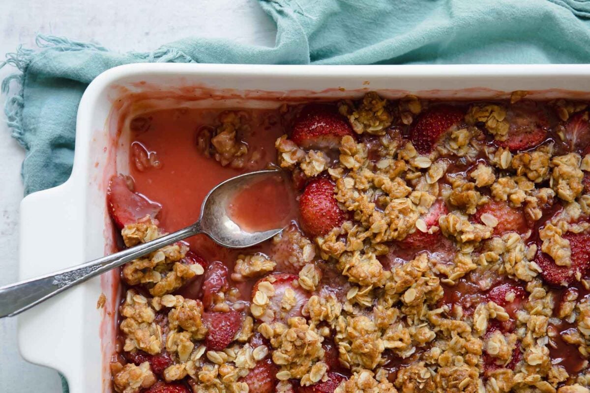 A baking dish full of strawberry crisp.