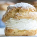 A cream puff on a plate.