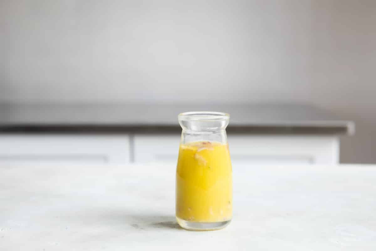Lemon vinaigrette on a counter.