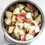 Boiled potatoes in a silver saucepan.
