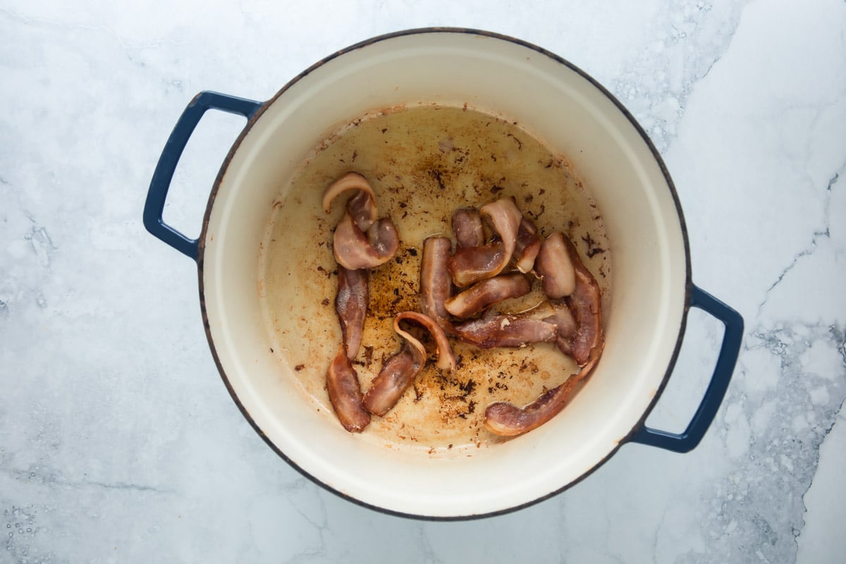 Cooking bacon in a dutch oven.