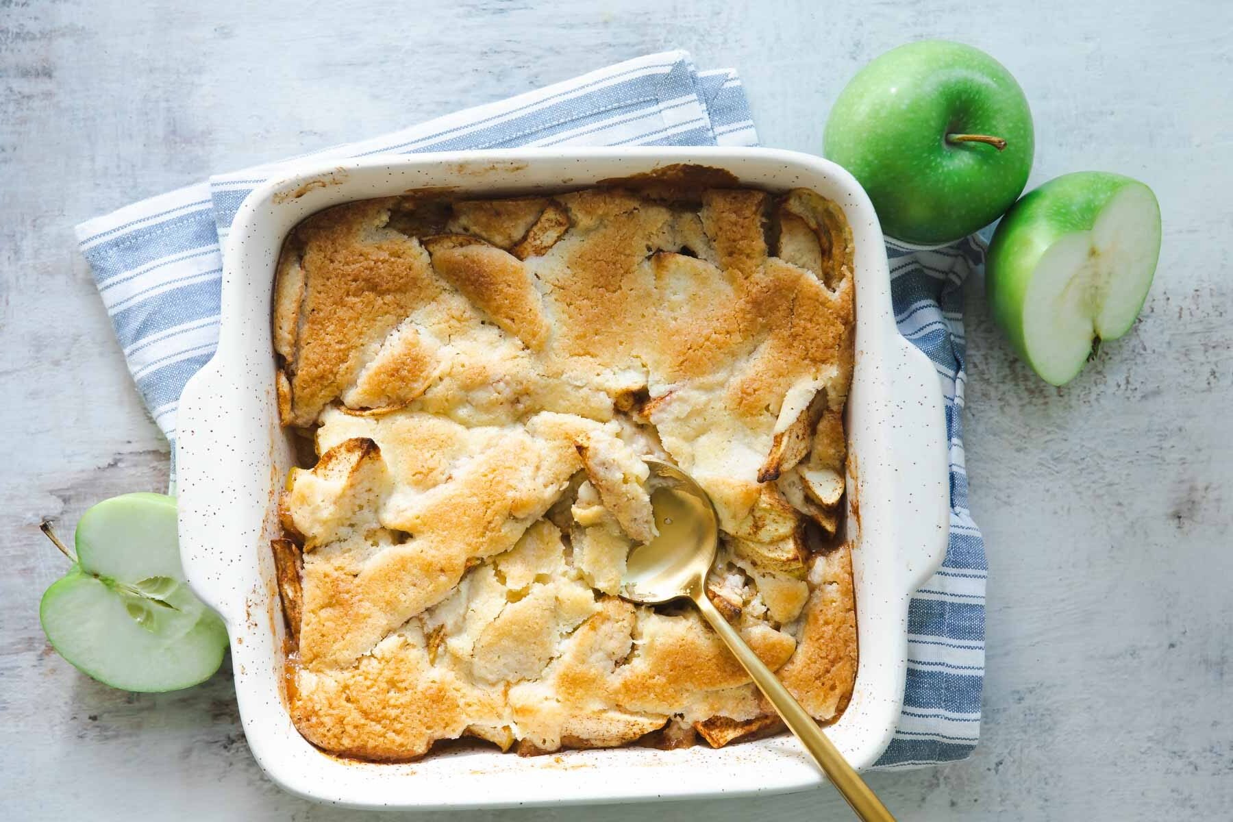 A baking dish of apple cobbler.