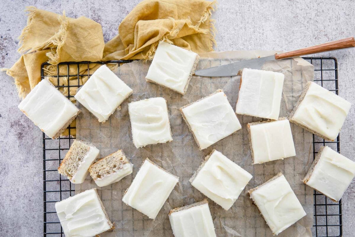 A board full of cut up banana bars.