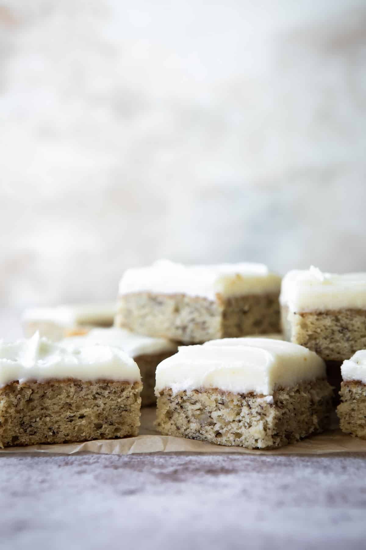 A pile of frosted banana bars.