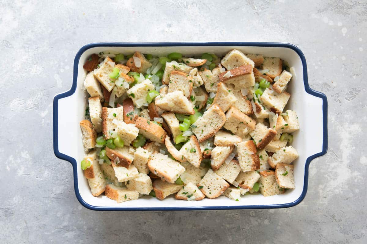 A baking dish full of gluten free stuffing.