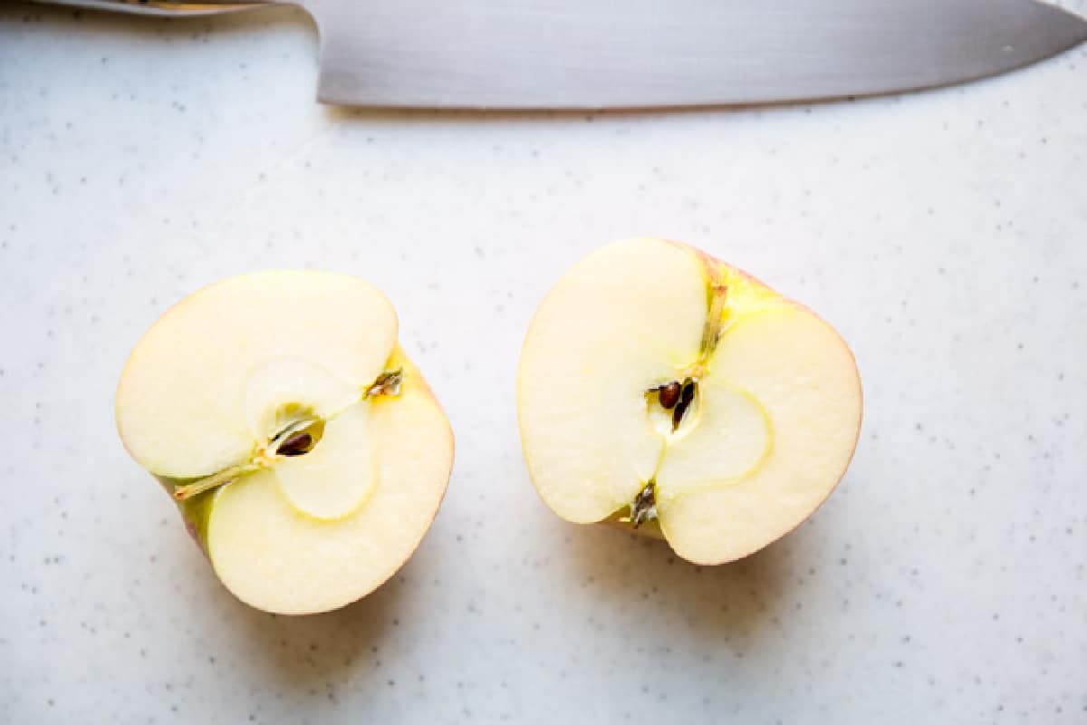 An apple cut in half.