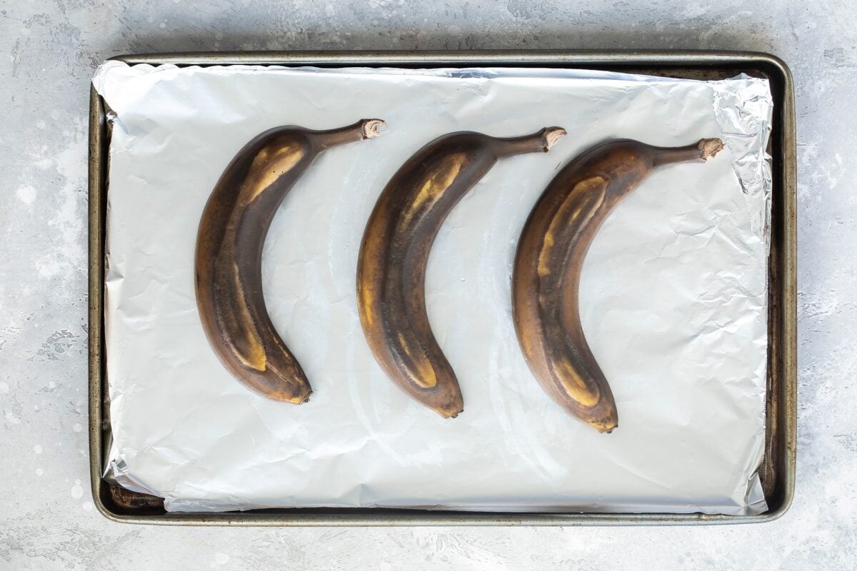 3 ripe bananas on a baking sheet.