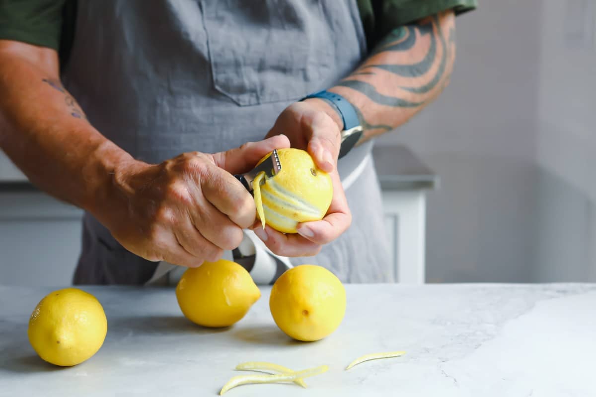A lemon being zested.
