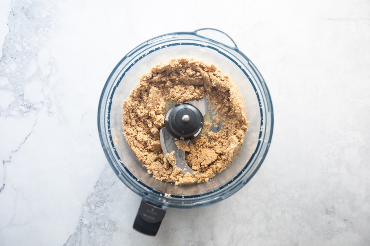 Making a pecan crust in a food processor.