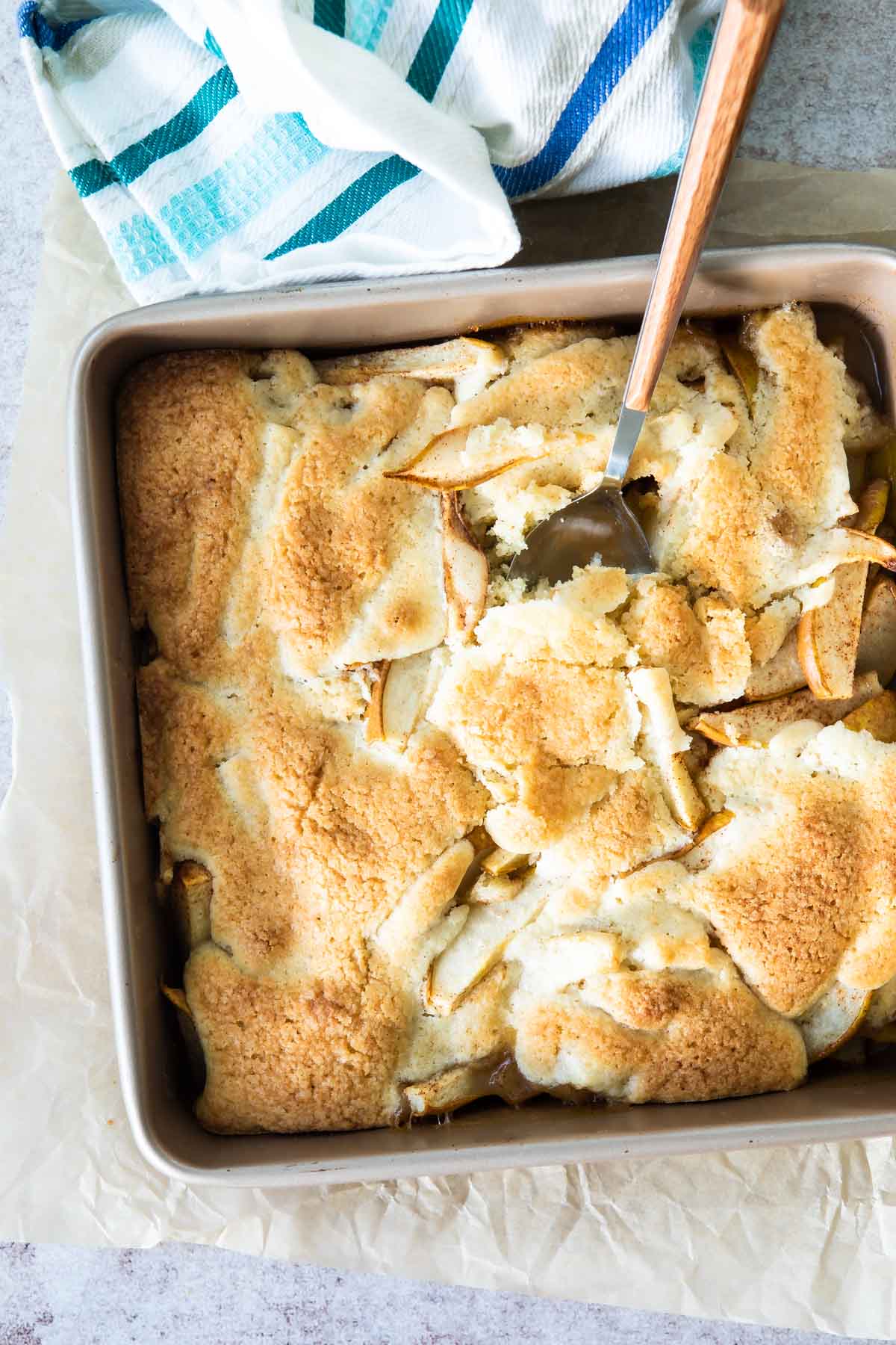 A baking dish of pear cobbler.
