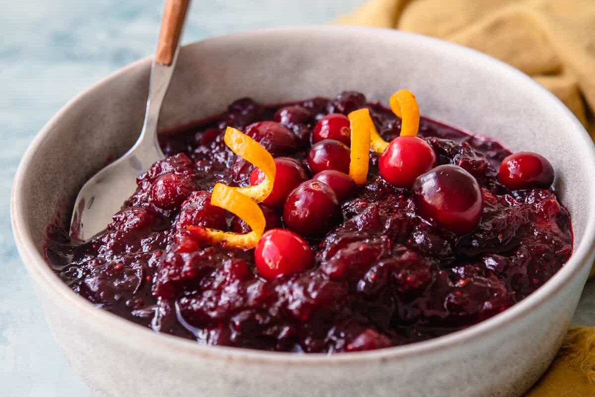 A bowl of cranberry sauce.