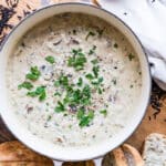 A Dutch oven full of turkey wild rice soup.