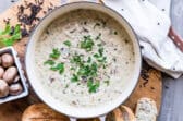 A Dutch oven full of turkey wild rice soup.
