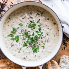 A Dutch oven full of turkey wild rice soup.