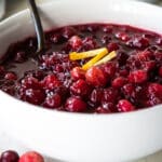 Cranberry sauce in a white bowl.