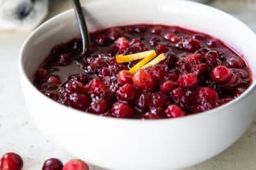 Cranberry sauce in a white bowl.