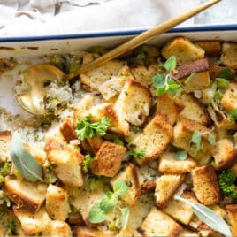 A casserole dish with gluten free stuffing in it.
