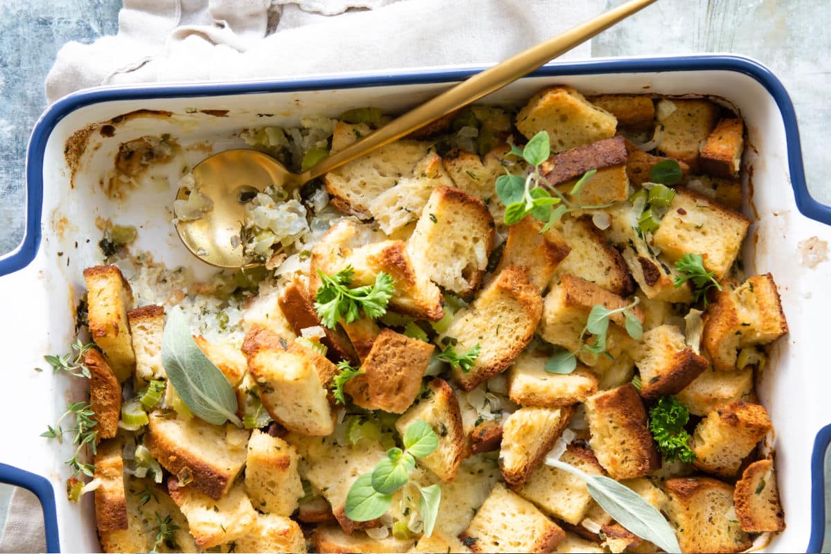 A casserole dish with gluten free stuffing in it.