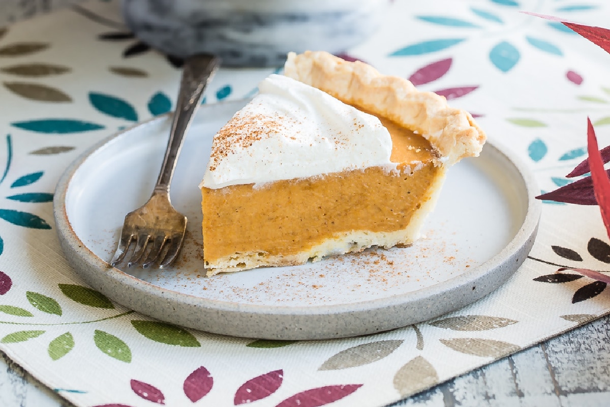 A slice of Make Ahead Pumpkin Pie.