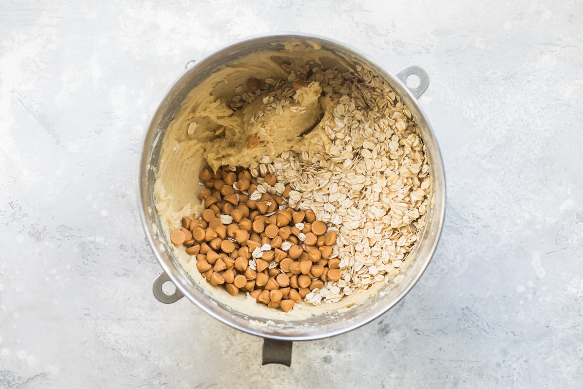 Oatmeal scotchie cookie dough in a mixing bowl.