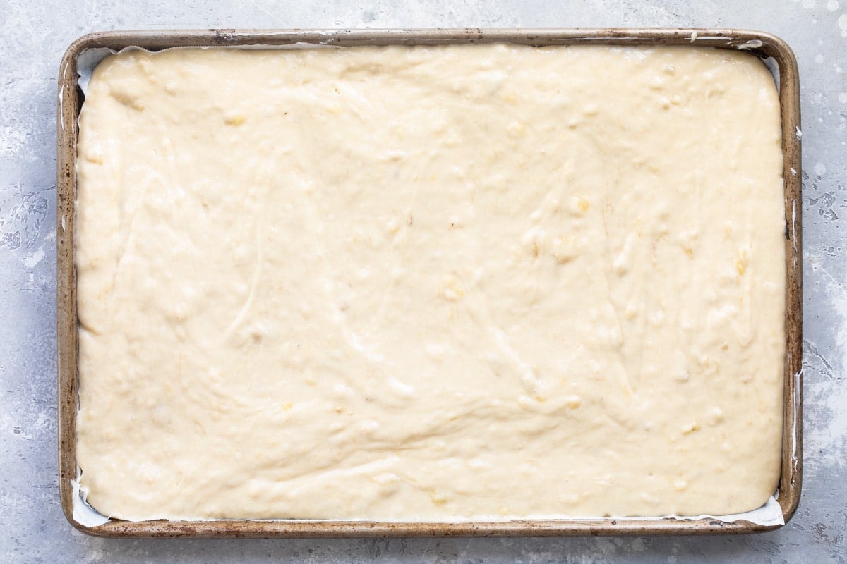 A pan of unbaked banana bars.