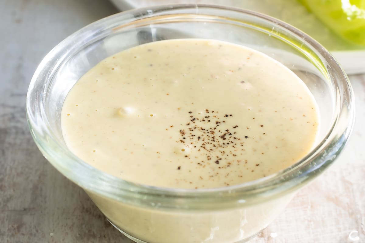 Caesar salad dressing in a bowl.