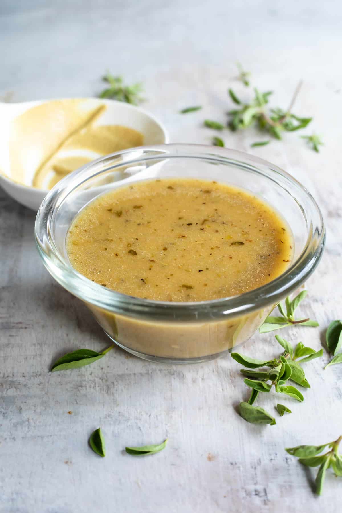 Dijon Vinaigrette in a clear glass dish.