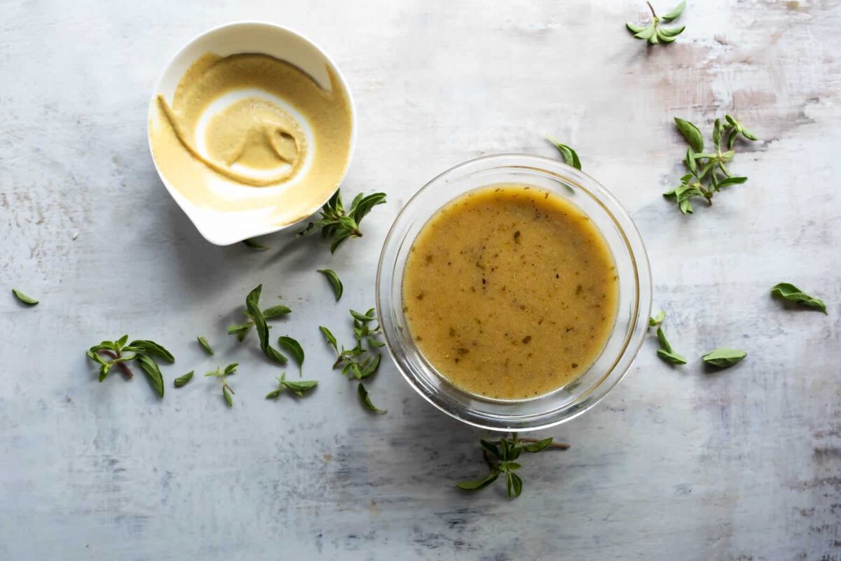 Dijon Vinaigrette in a clear glass dish.