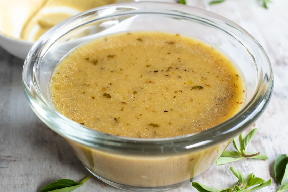 Dijon Vinaigrette in a clear glass dish.