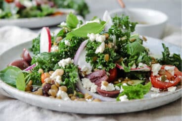 A plate with a serving of Mediterranean Lentil Salad.