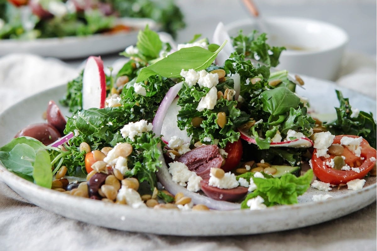A plate with a serving of Mediterranean Lentil Salad.