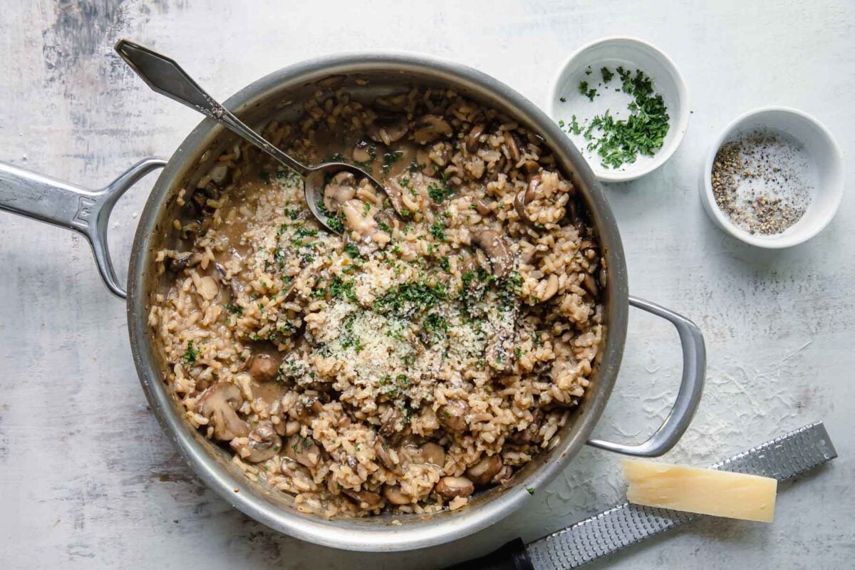 A skillet full of mushroom risotto.