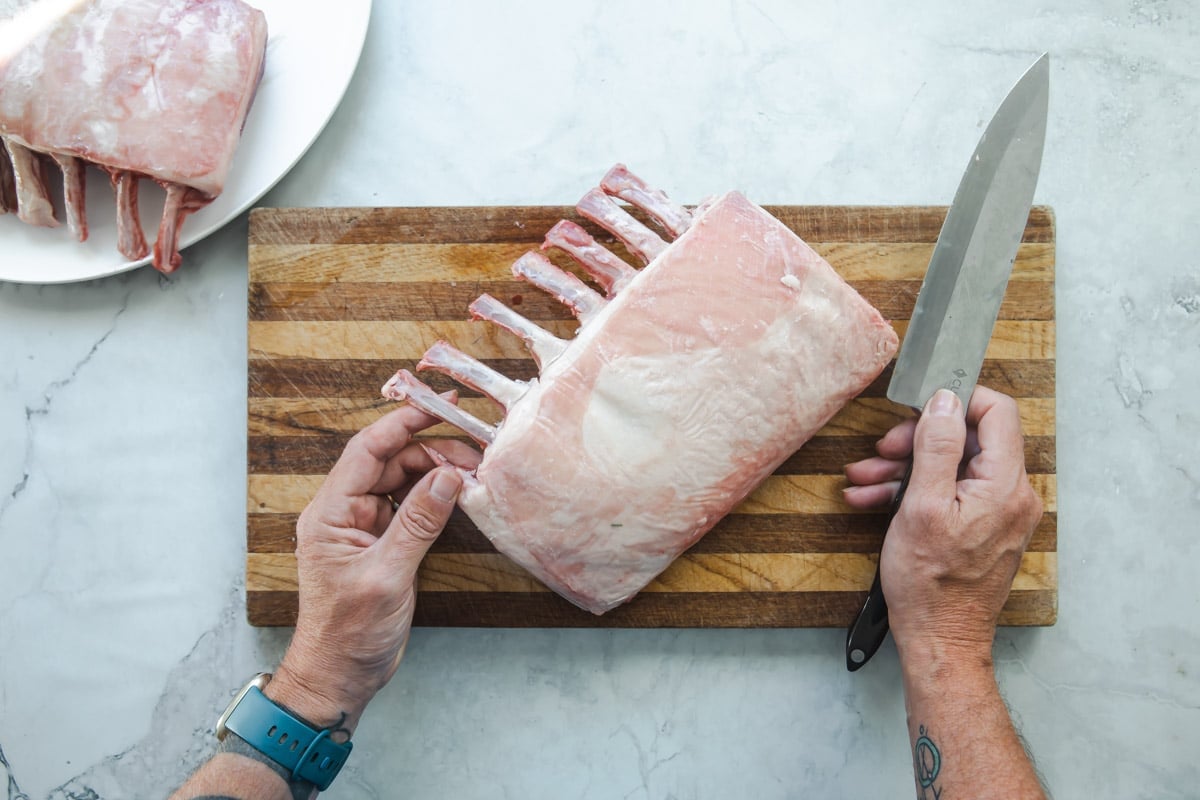 Frenching a rack of lamb.