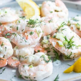 Shrimp salad on a blue plate.