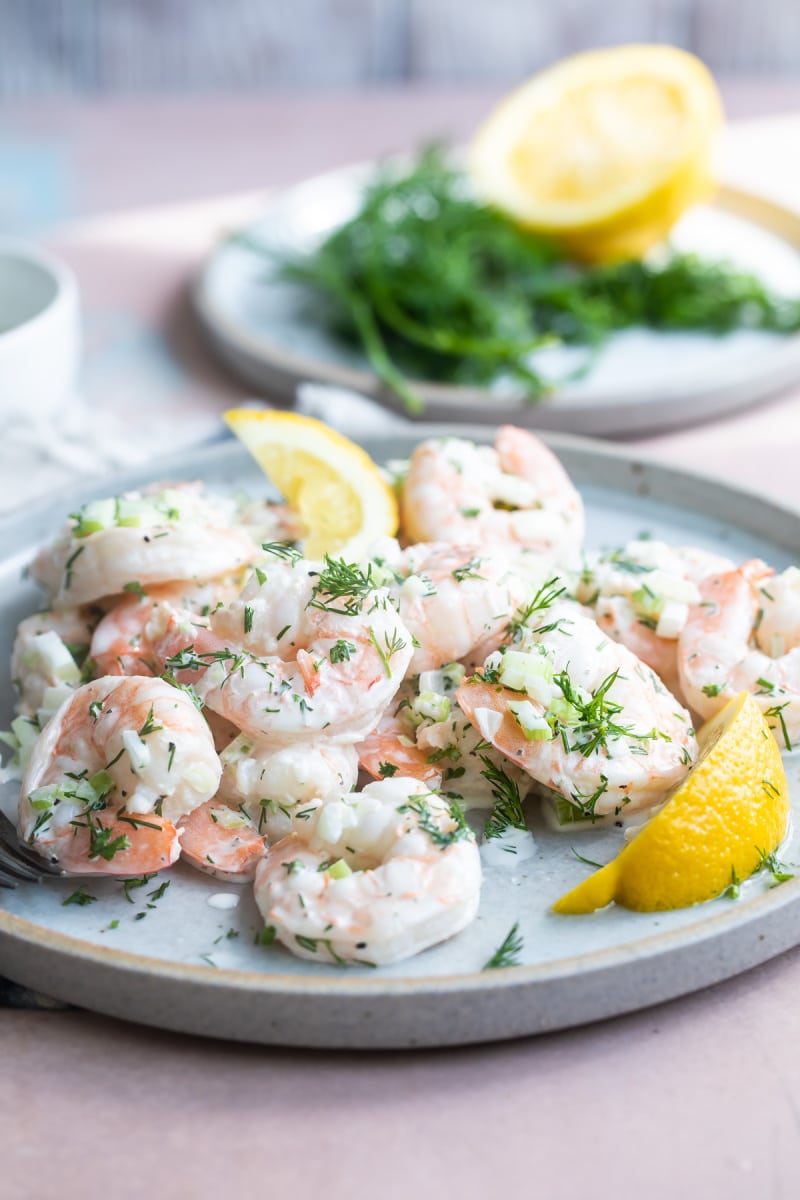 Shrimp salad on a blue plate.